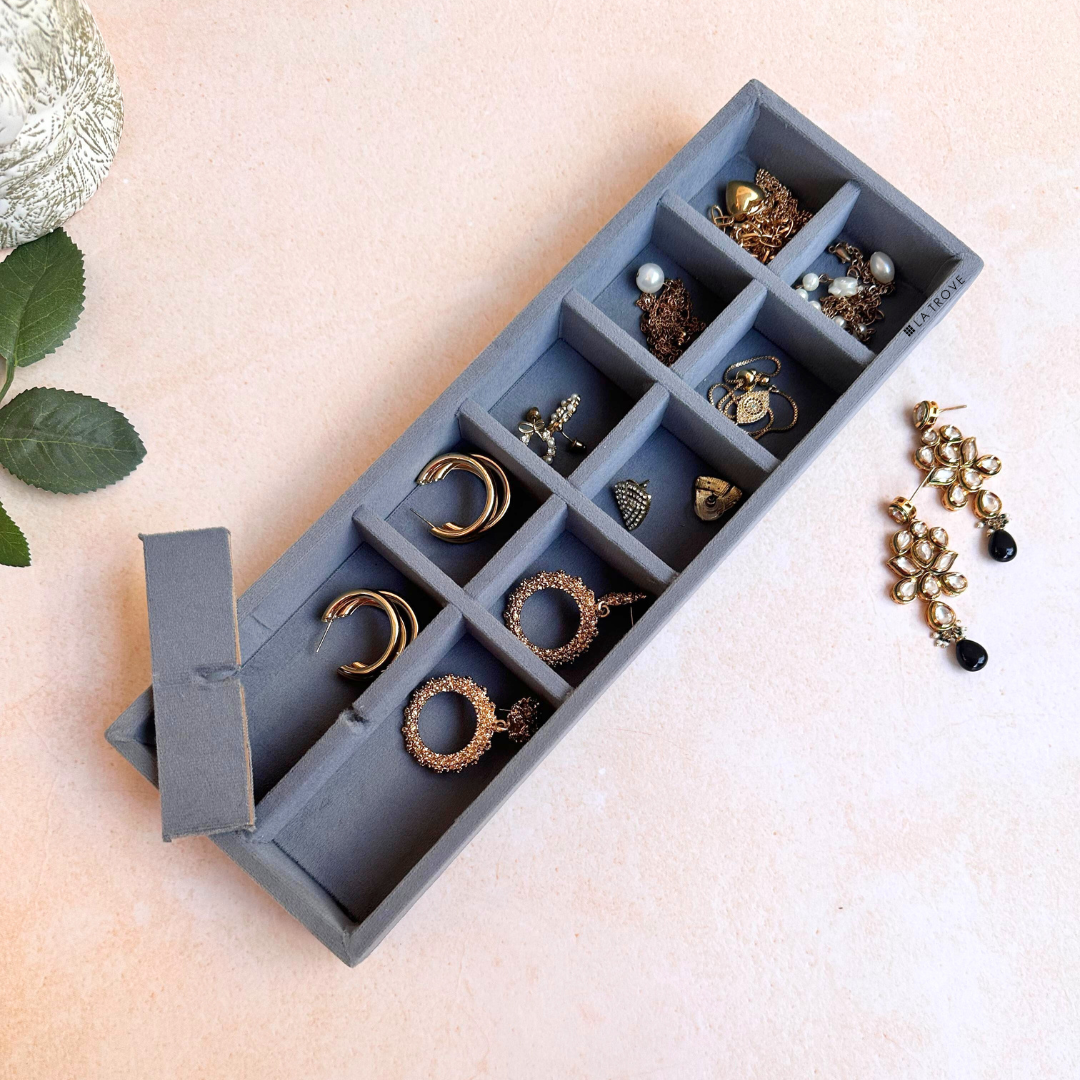 Grey velvet 12 grid sleek tray for rings, earrings, and cufflinks.