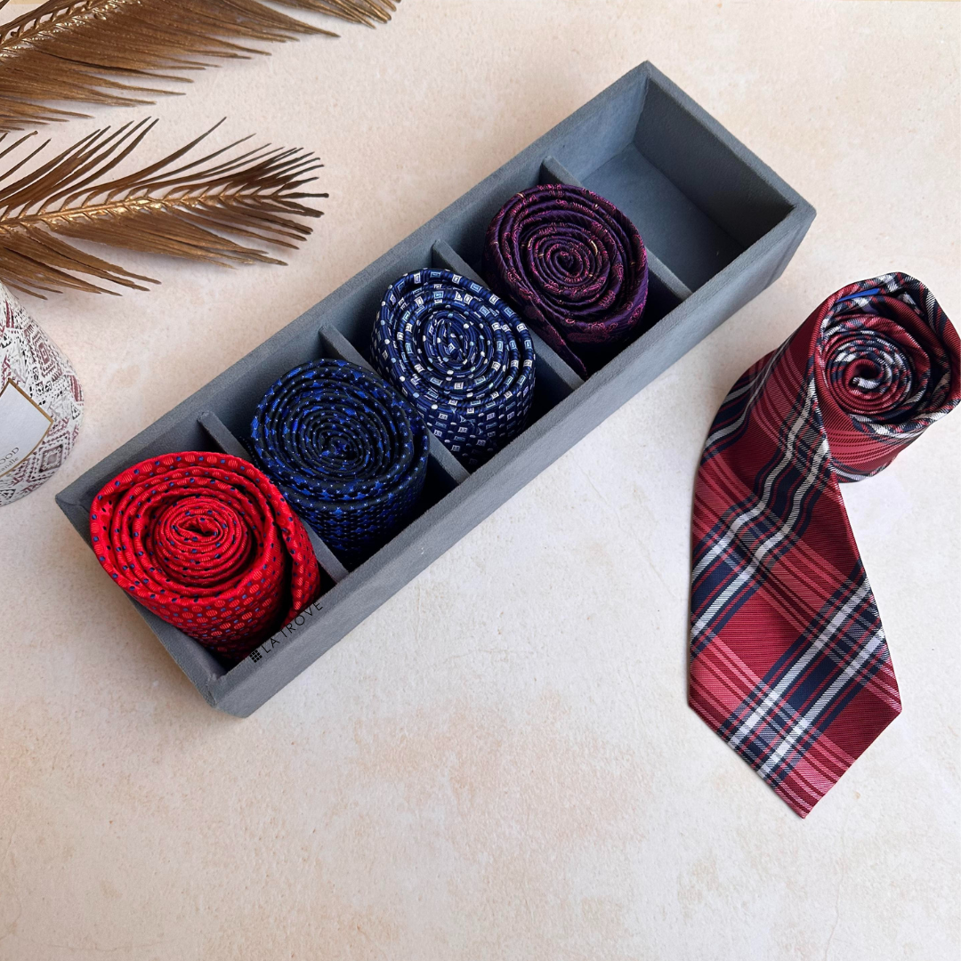 5-slot tie and pocket square organizer in grey velvet.