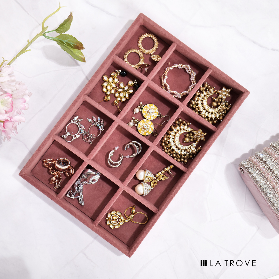 Dark pink 12-slot velvet tray for storing rings, studs, and charms.