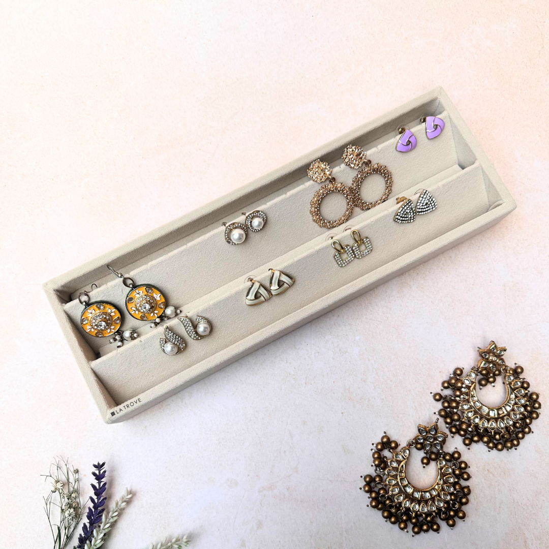Cream velvet earring tray organiser with slots for studs and hoops