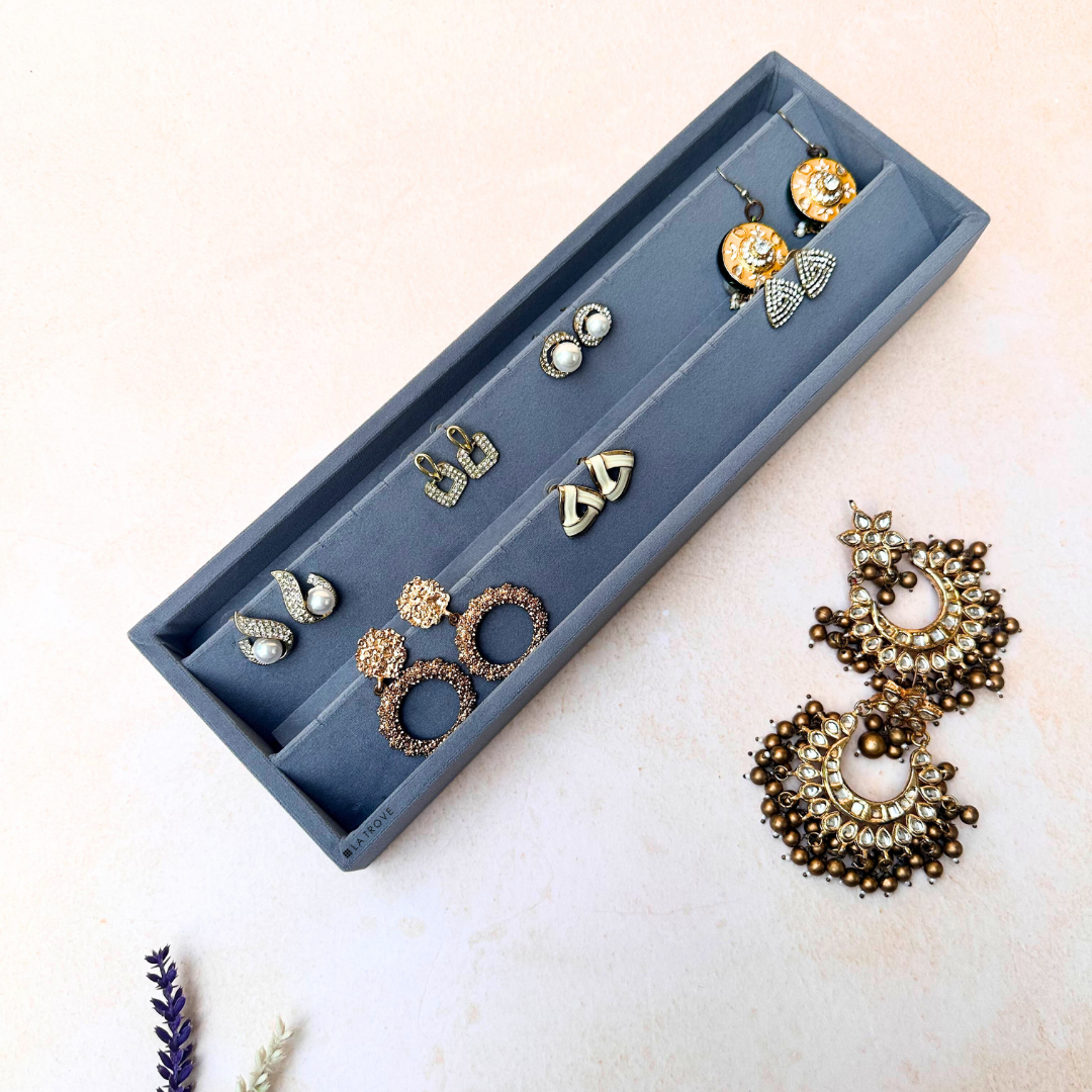 Grey earring tray organiser with soft velvet lining and multiple slots