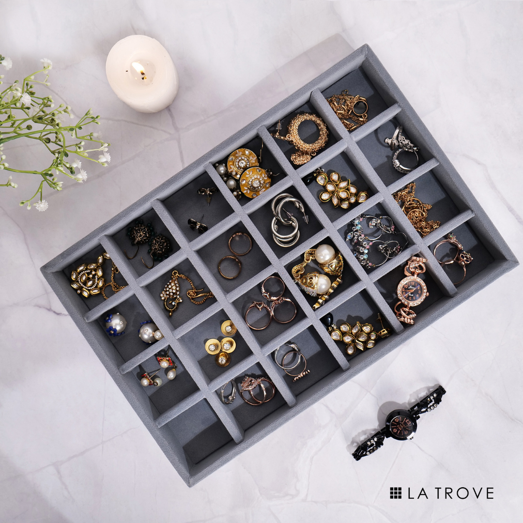 Grey 24-compartment jewellery organizer tray with soft velvet lining.