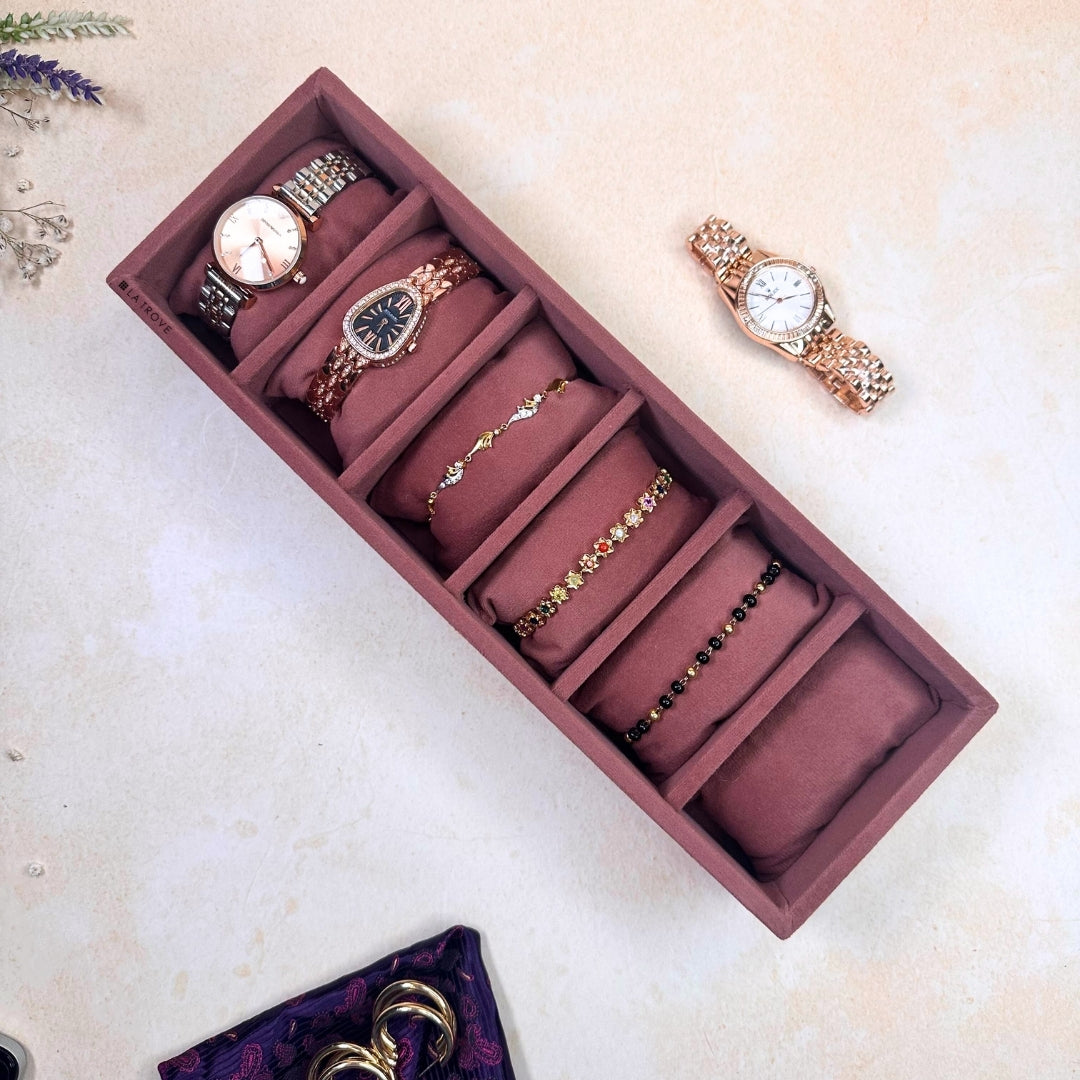 Dark pink velvet 6 slot watch and bracelet organizer tray.