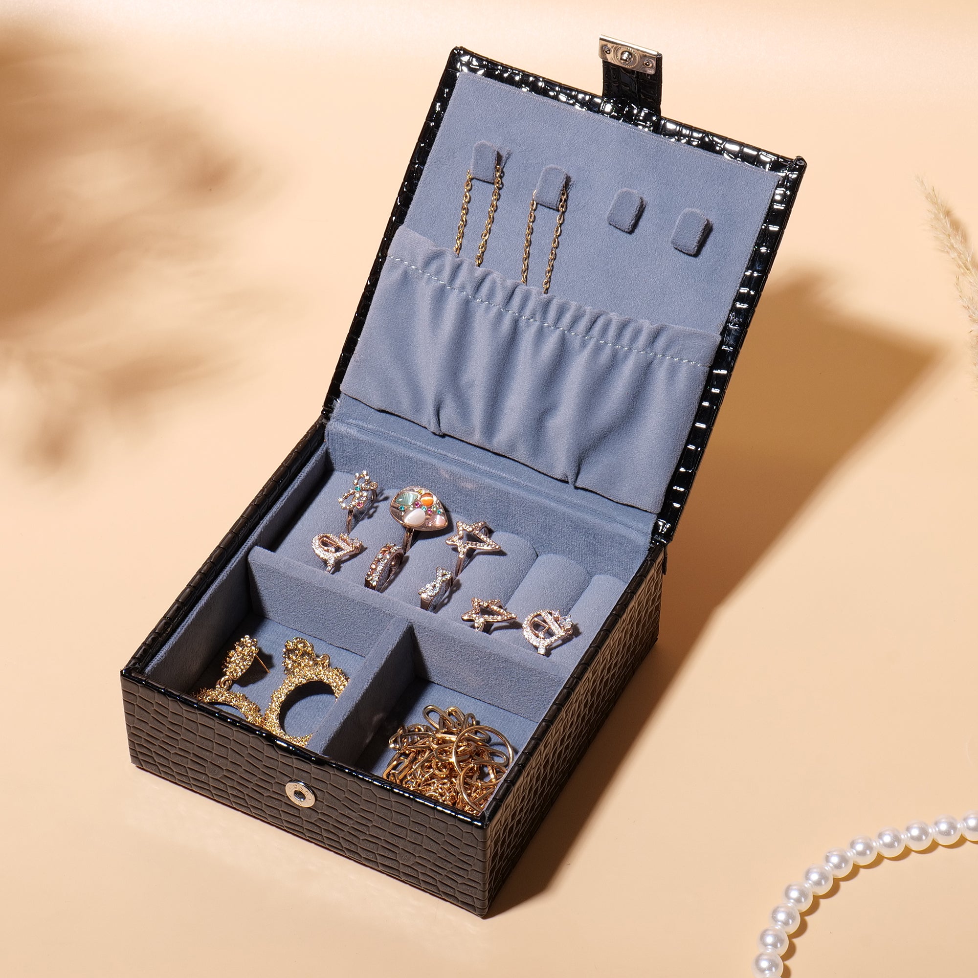 Black jewellery organiser box for rings, earrings and accessories.