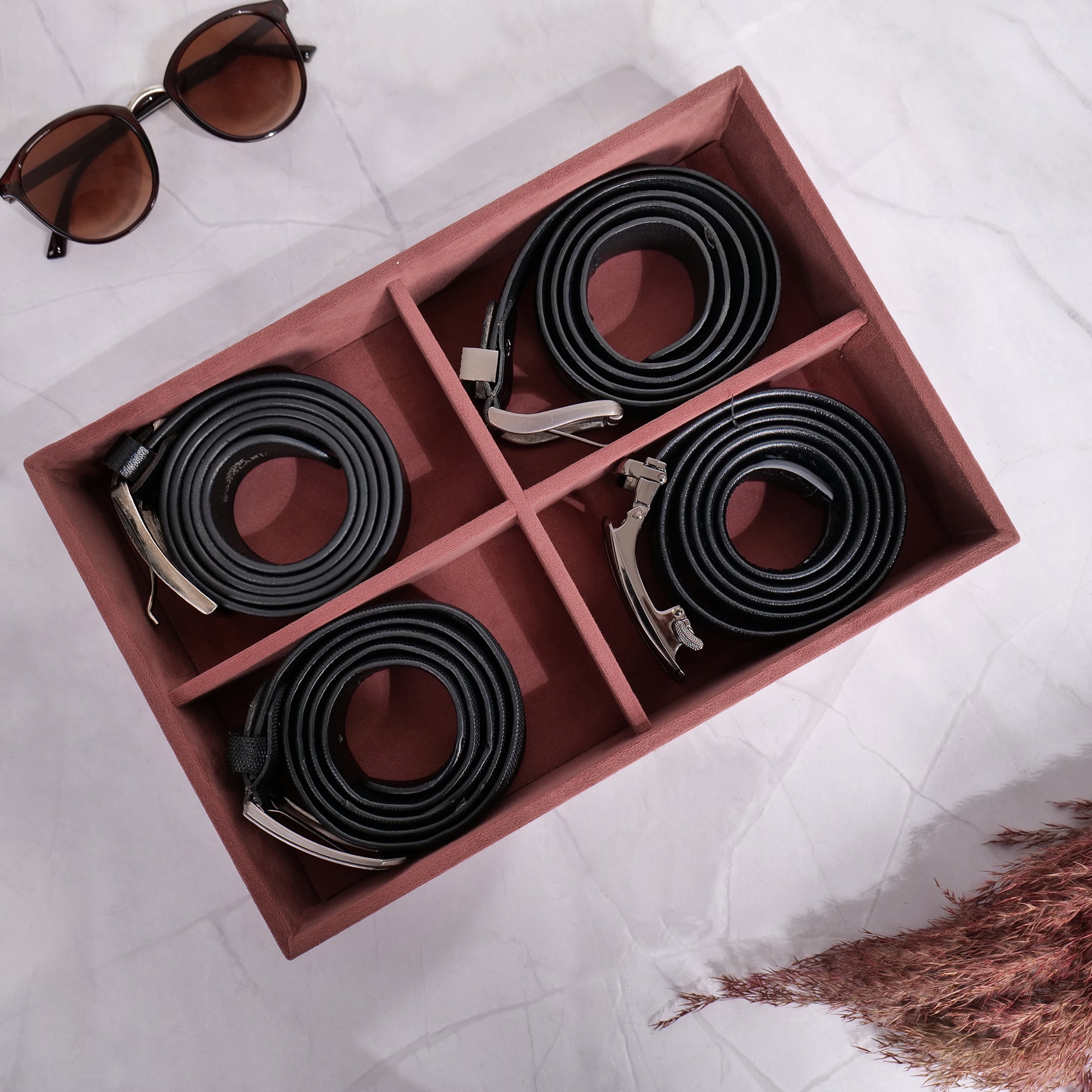 Dark pink 4-slot belt tray with soft velvet lining and elegant design