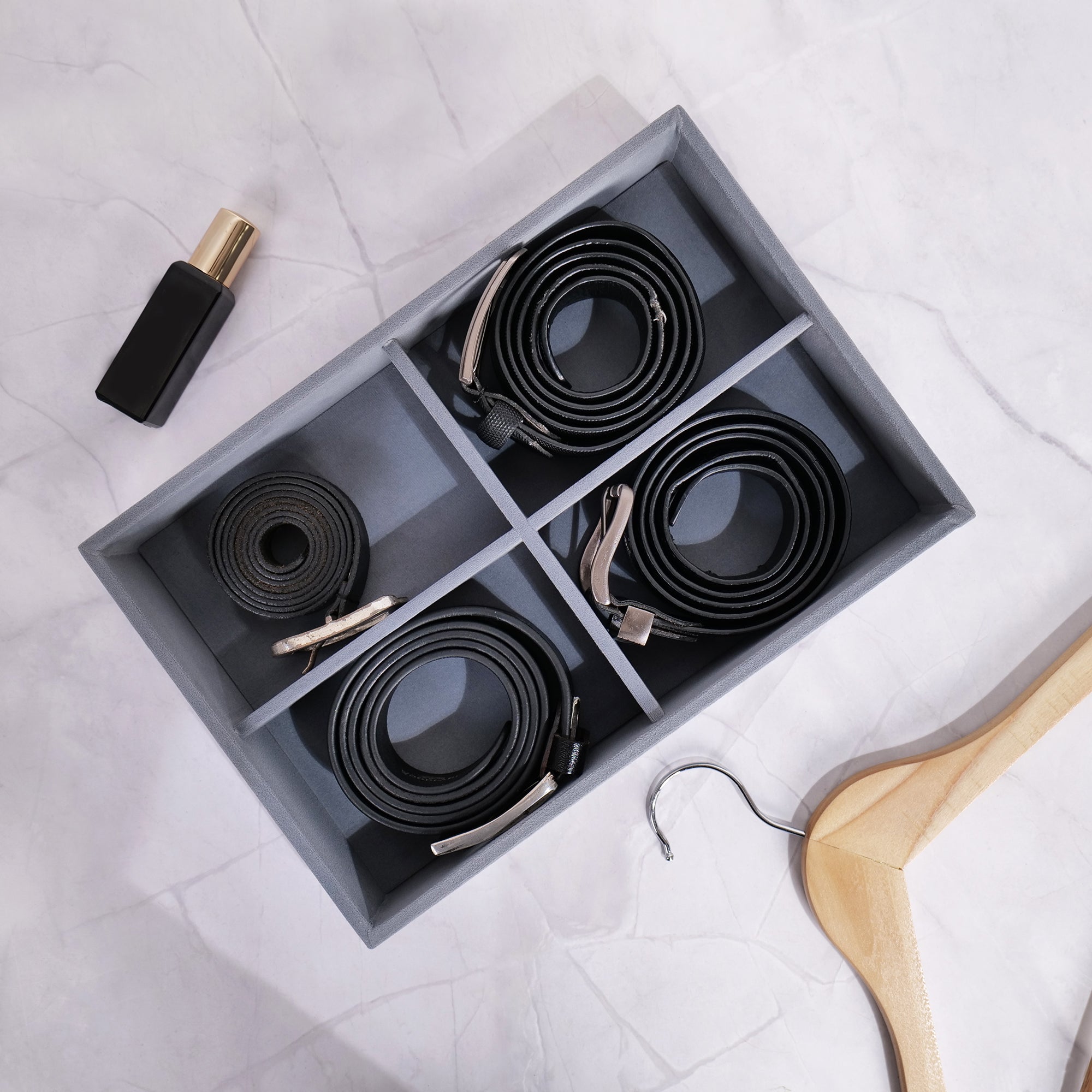 Grey 4-slot velvet belt tray with padded compartments and leatherette finish