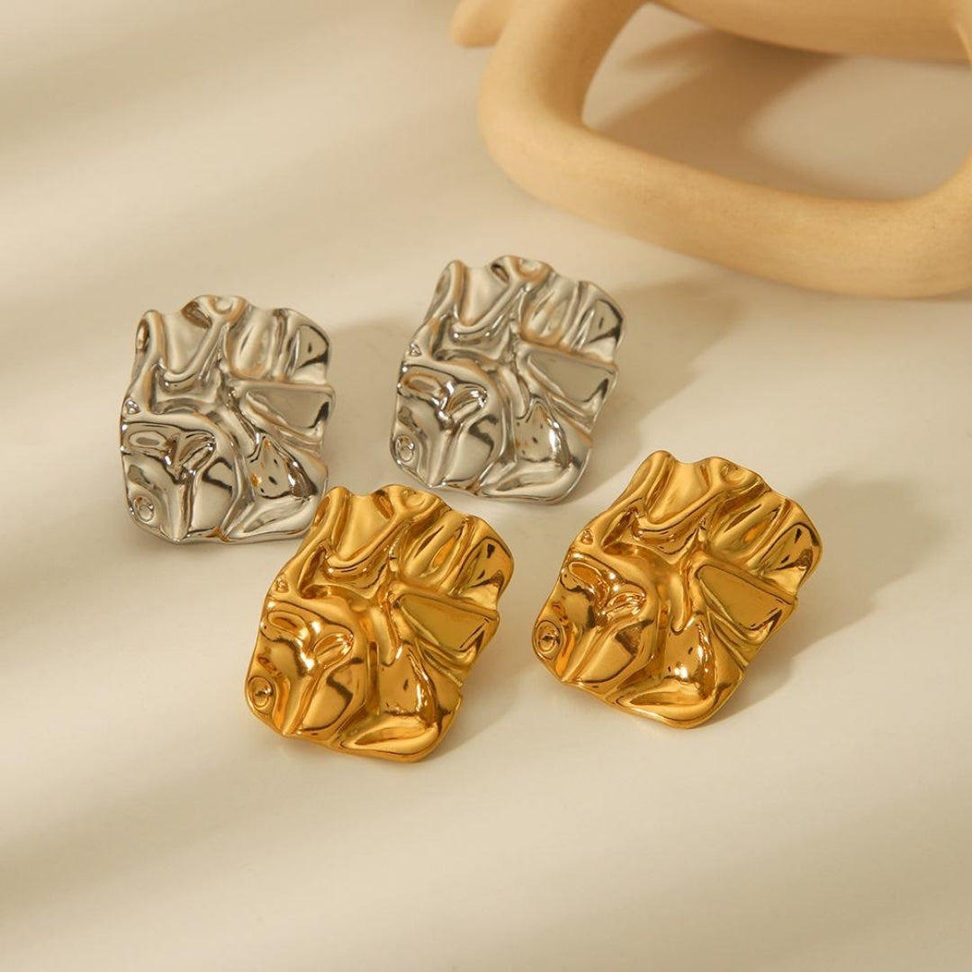 Lightweight party wear gold earrings.