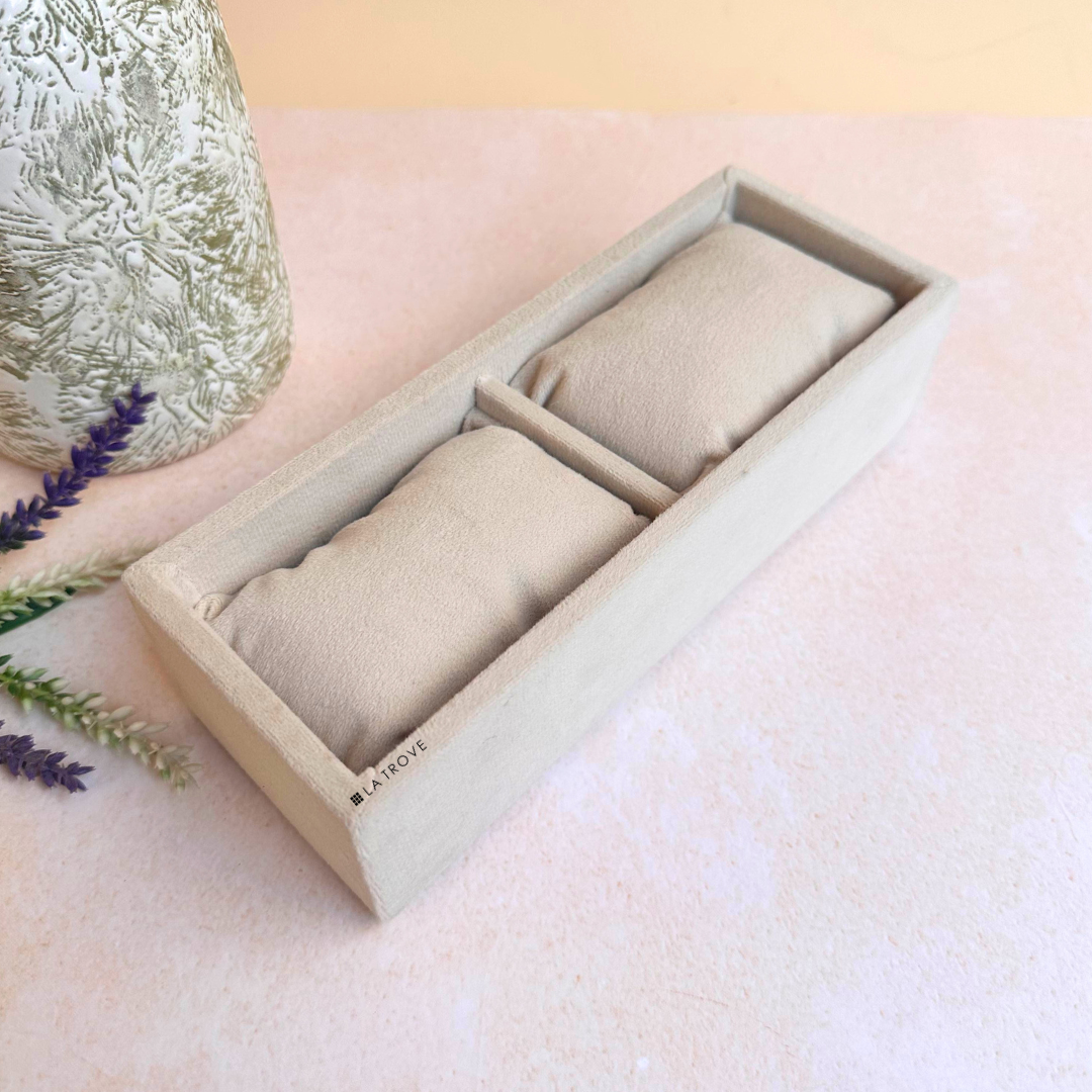 Top view of cream leatherette tray with 2 watch compartments