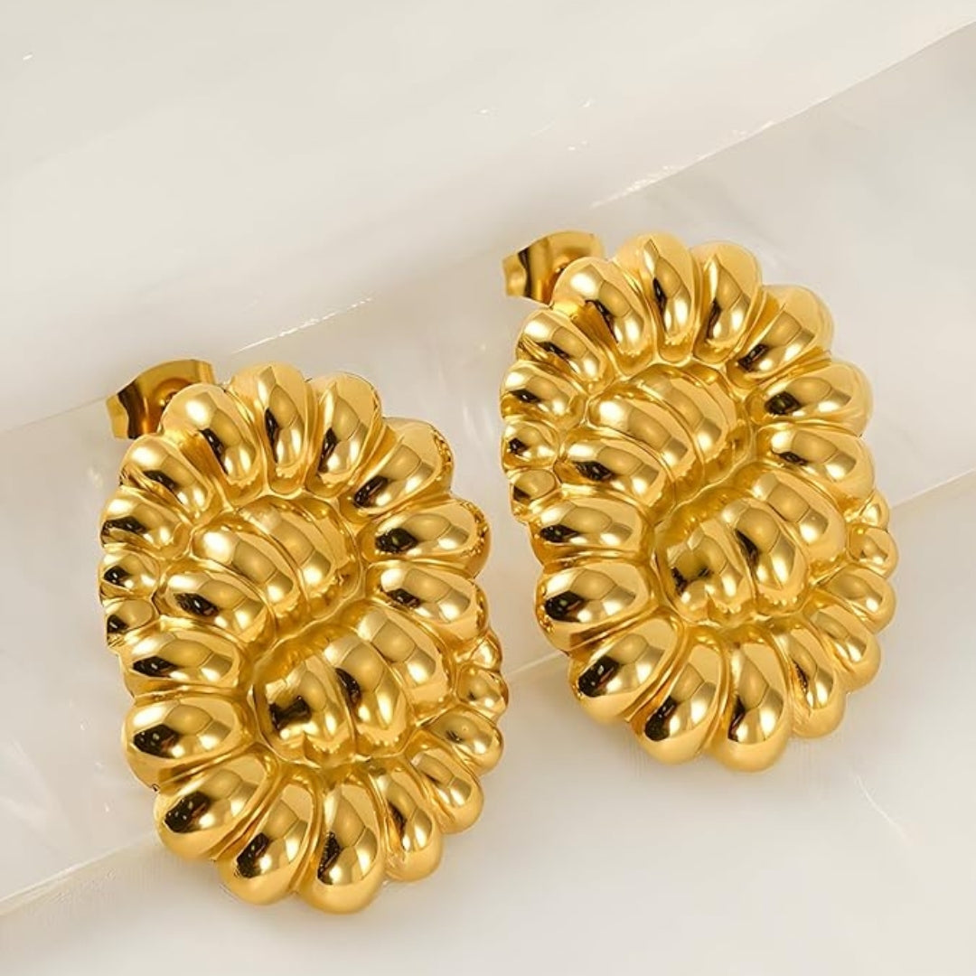 Elegant textured gold statement earrings for women.