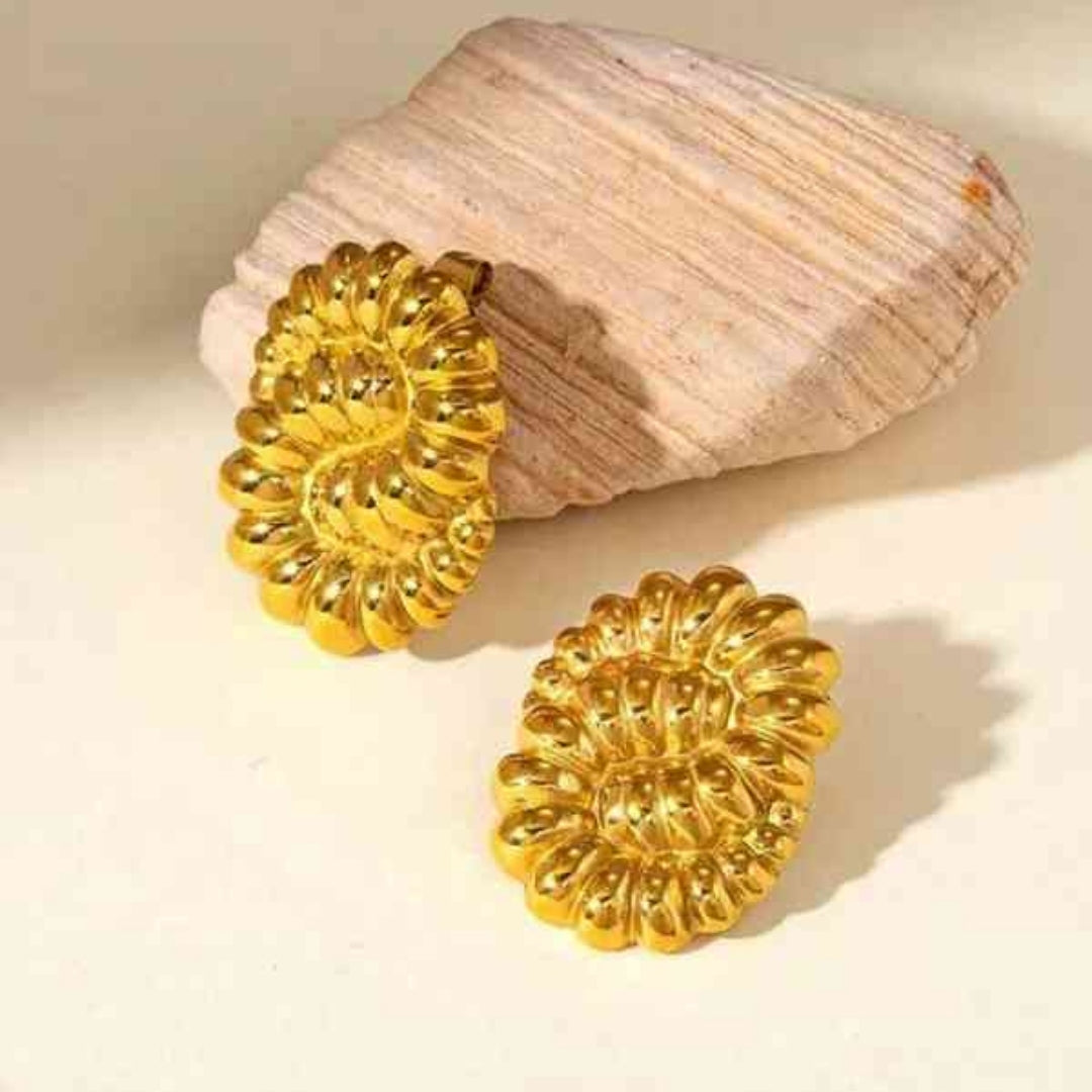 Designer textured gold statement earrings by La Trove.