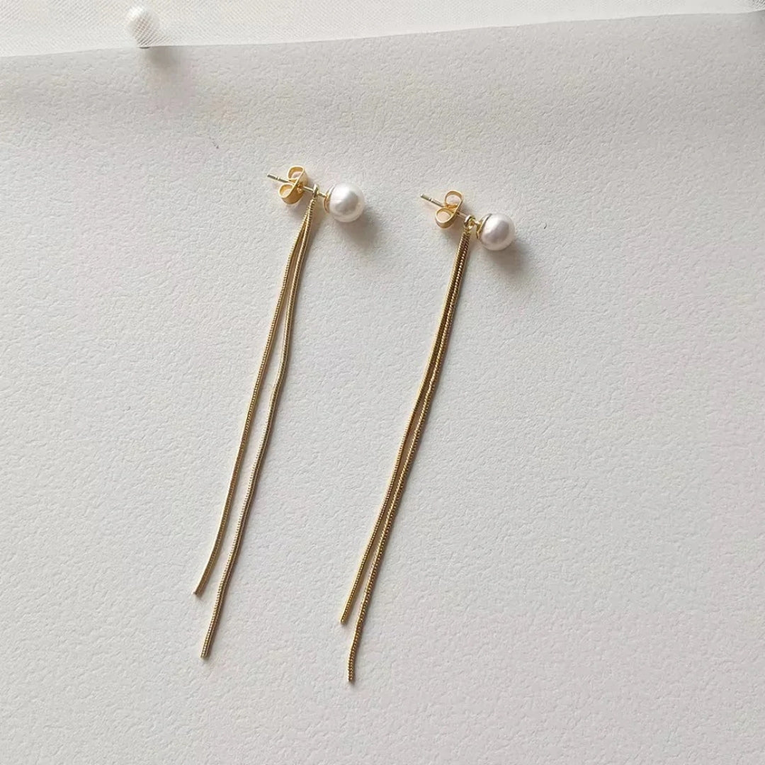 Pearl drop chain earrings by La Trove.