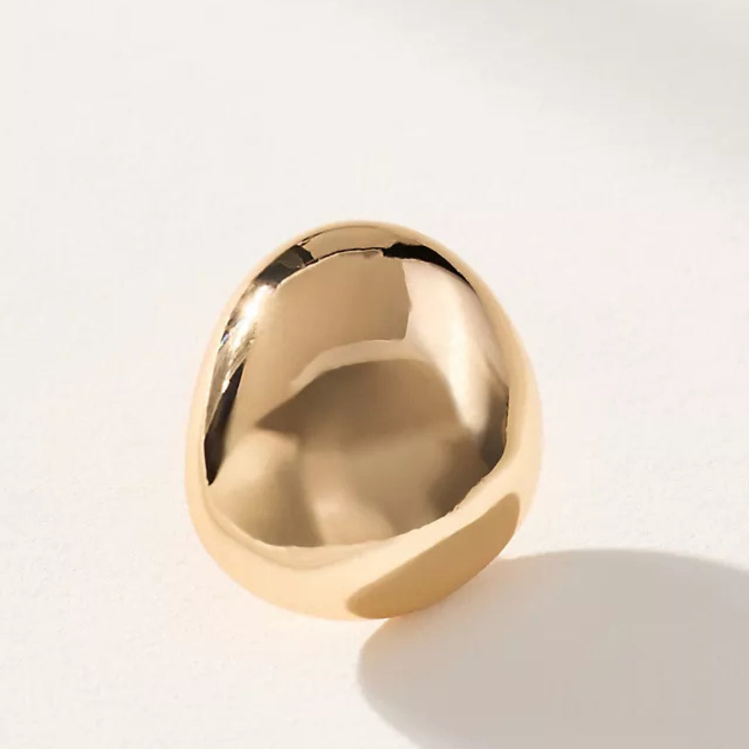 Timeless small gold ball earrings for everyday wear.