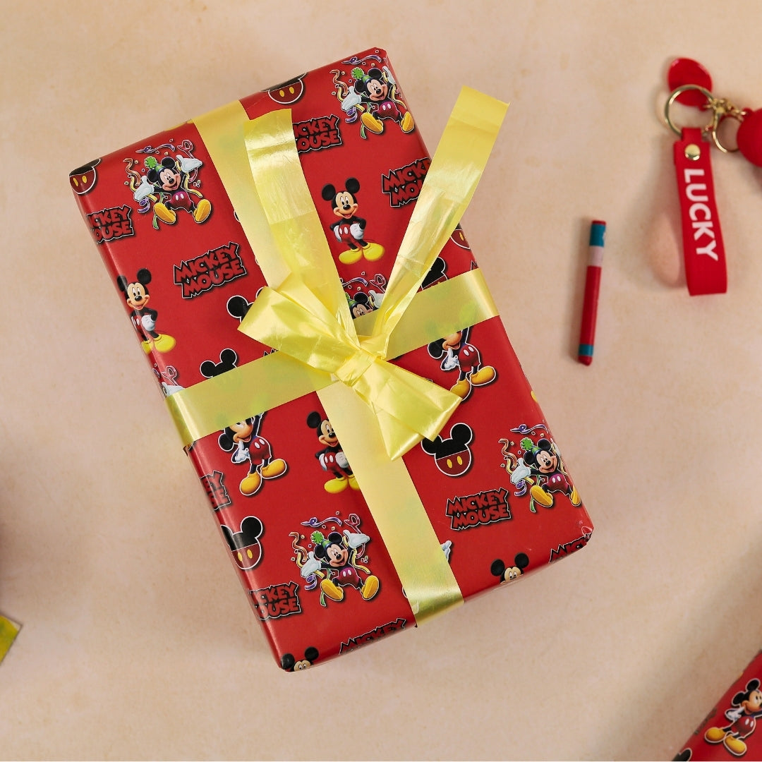 Mickey Mouse red themed gift wrapping paper roll.