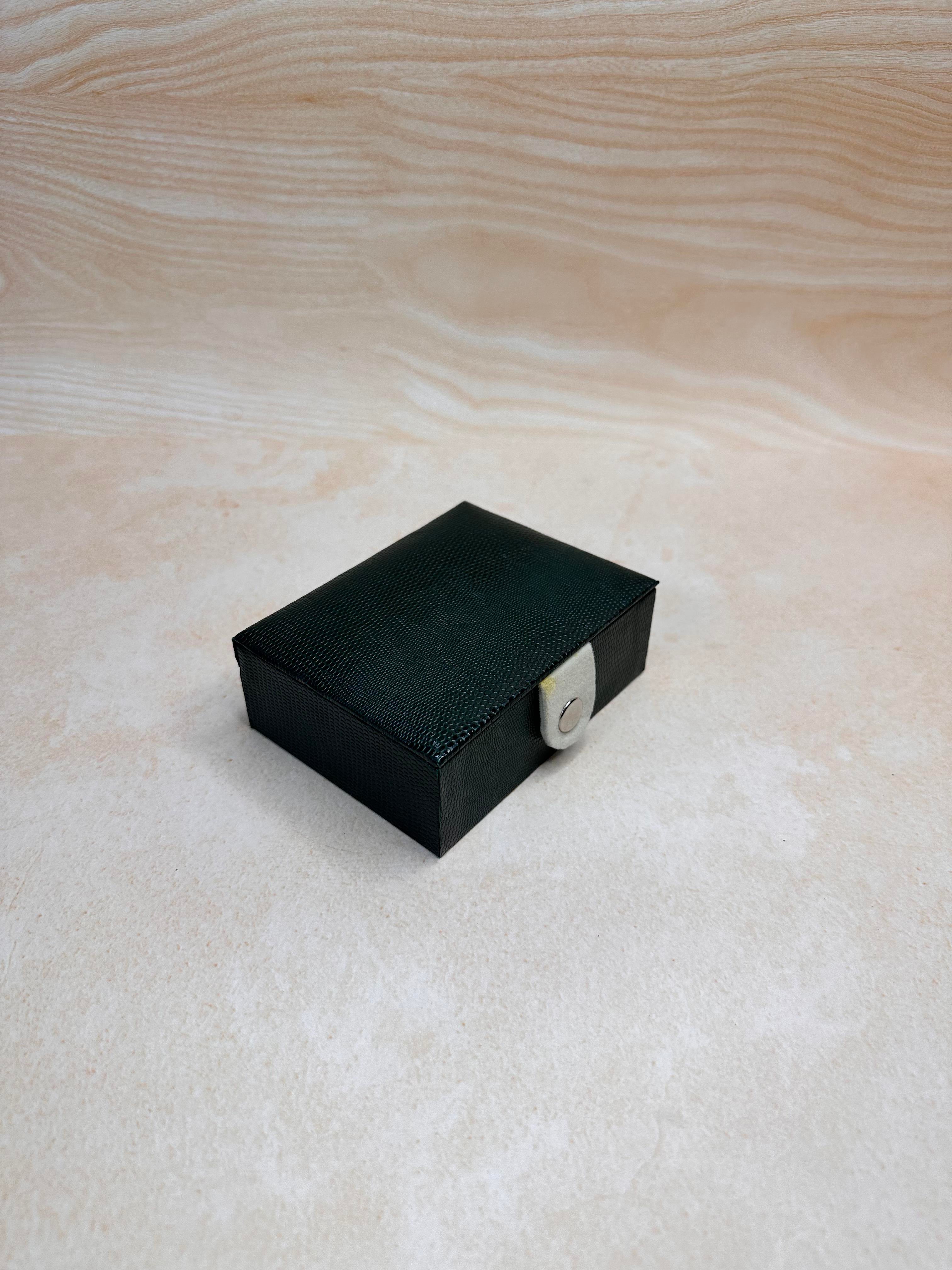 Green jewellery organiser box for earrings, rings and delicate pieces.