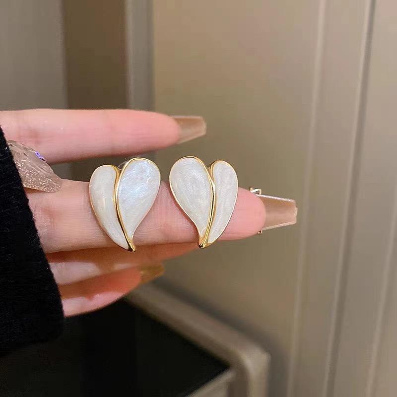 Heart Stud Earrings by La Trove – Cute Minimal Romantic Jewelry.